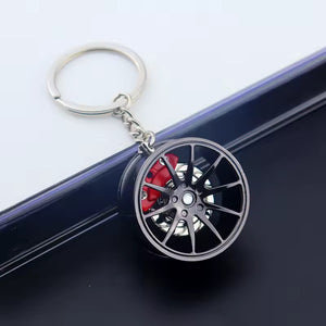 Spinning Alloy Wheel Keychain – Vented Brake Disc Style - Alloy Wheel Keychain – Spinning Car Rim with Brake Caliper - Car LED Poster - NOXLUX Decor