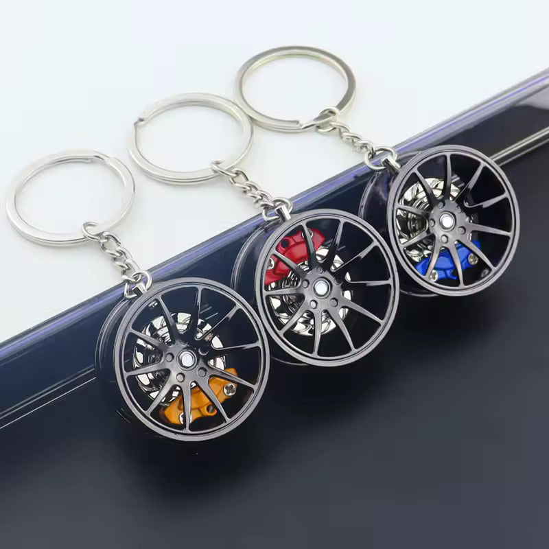Spinning Alloy Wheel Keychain – Vented Brake Disc Style - Alloy Wheel Keychain – Spinning Car Rim with Brake Caliper - Car LED Poster - NOXLUX Decor