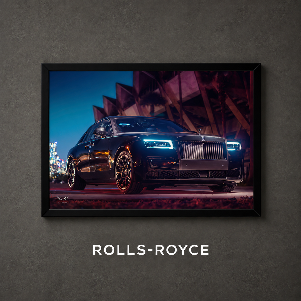 Framed Rolls-Royce car poster on a charcoal wall with collection label
